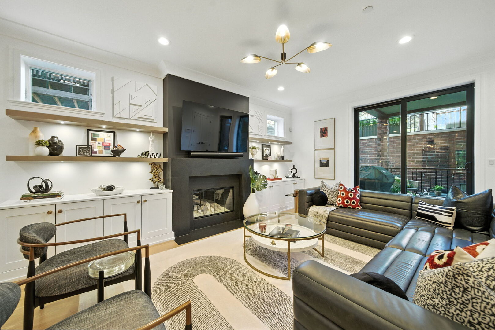 1733 North Mohawk Street, Unit 1N Chicago, IL 60614 - Photo 14 of 29 a living room with furniture fireplace and a flat screen tv