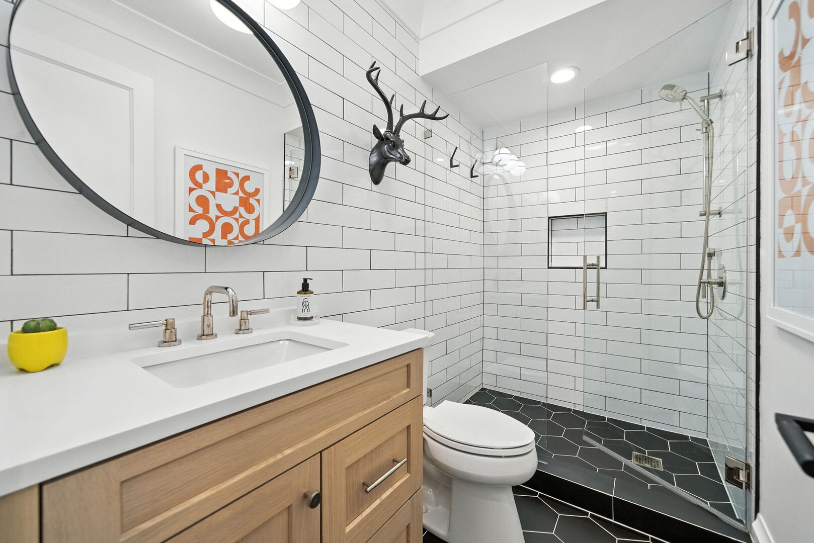 1733 North Mohawk Street, Unit 1N Chicago, IL 60614 - Photo 23 of 29 a bathroom with a sink a toilet and shower