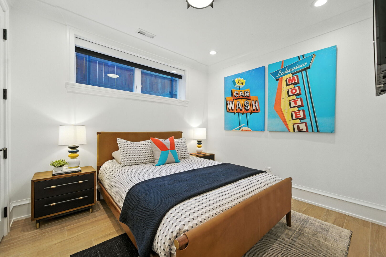1733 North Mohawk Street, Unit 1N Chicago, IL 60614 - Photo 24 of 29 a bedroom with bed and painting on the wall