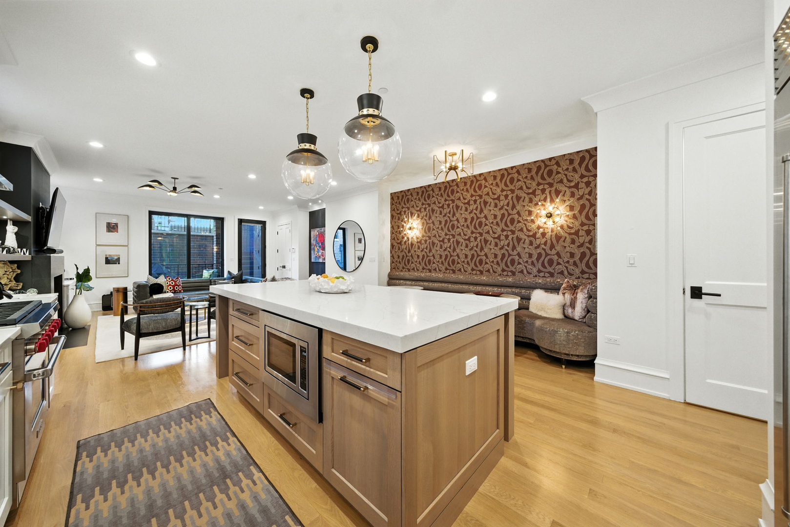 1733 North Mohawk Street, Unit 1N Chicago, IL 60614 - Photo 9 of 29 a kitchen with stainless steel appliances granite countertop a stove and a refrigerator