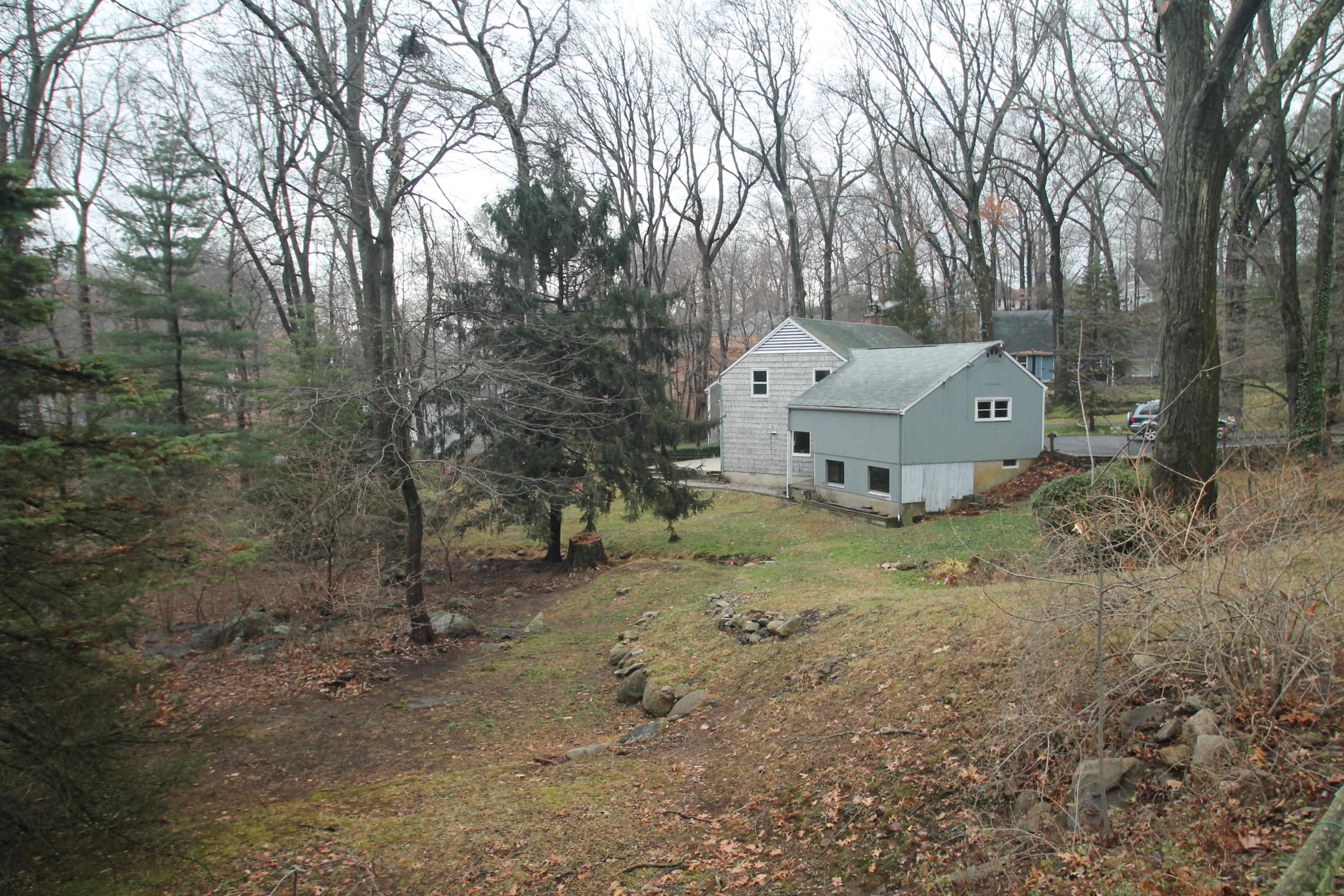 5 Little Brook Road Rowayton, CT 06853 - Photo 2 of 4 a view of a house with a yard
