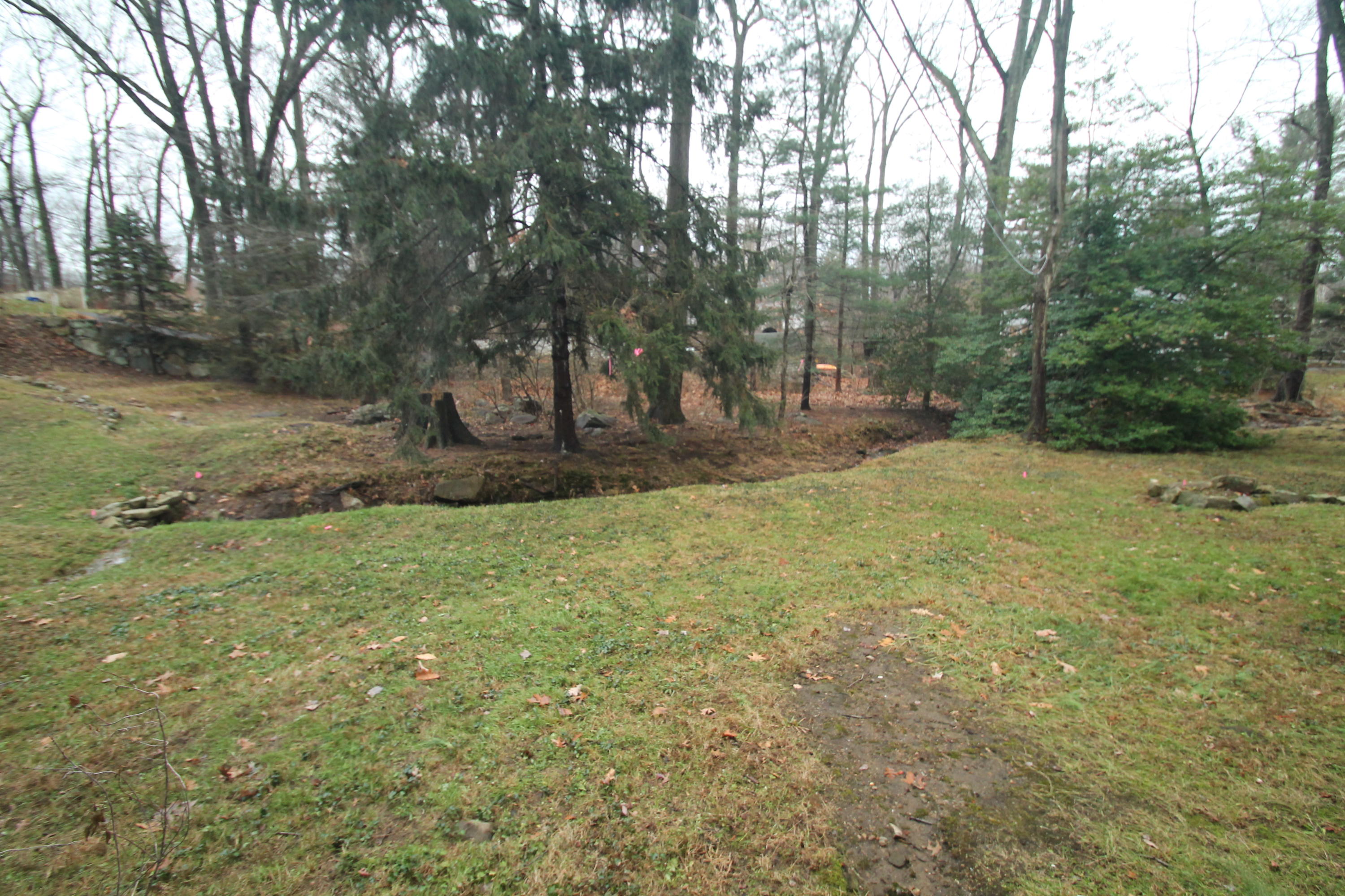 5 Little Brook Road Rowayton, CT 06853 - Photo 4 of 4 a view of a yard with trees