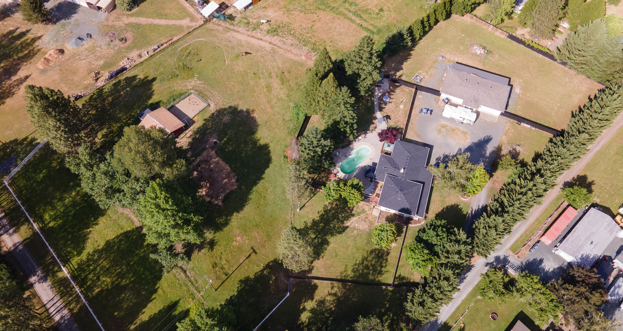 255 Queens Branch Road Rogue River, OR 97537 - Photo 60 of 60 an aerial view of residential houses with outdoor space