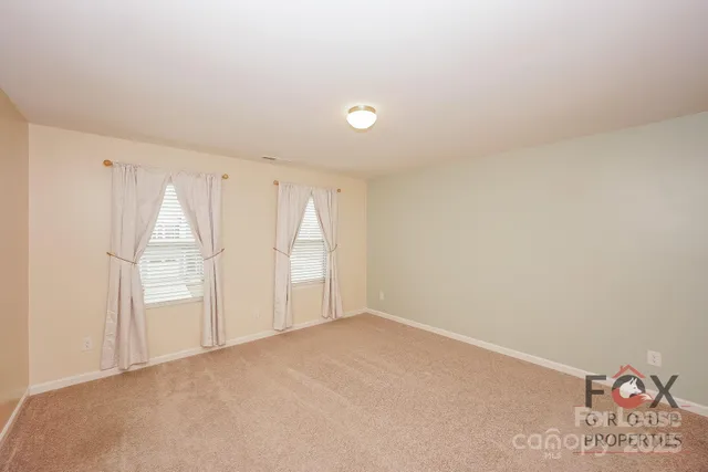 a bathroom with a sink vanity and mirror
