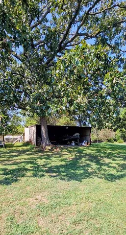 a view of a water fountain and an outdoor space