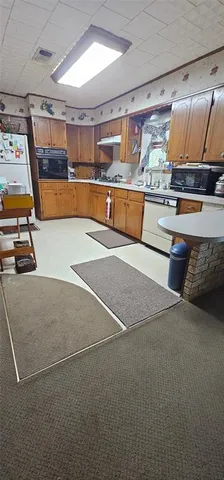 a bathroom with a sink mirror and vanity