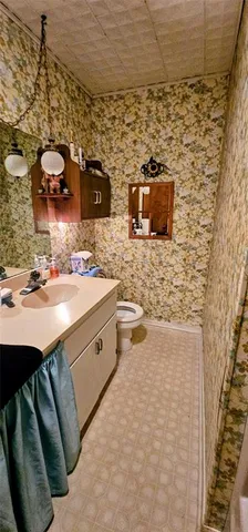 a view of a bathroom with shower