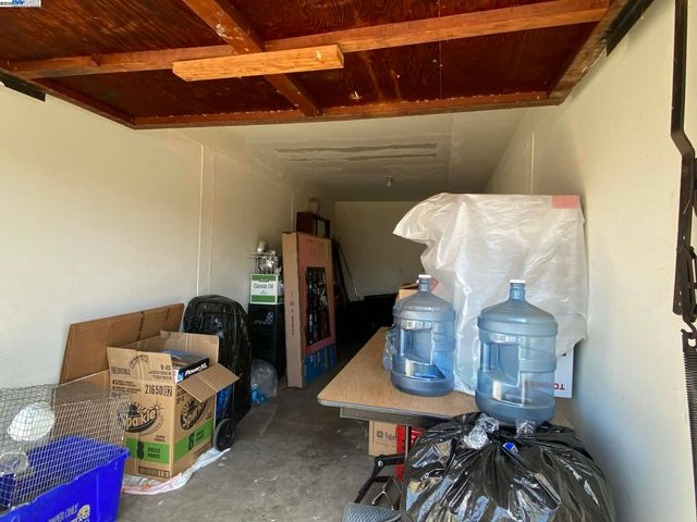 a room with furniture and gym equipment