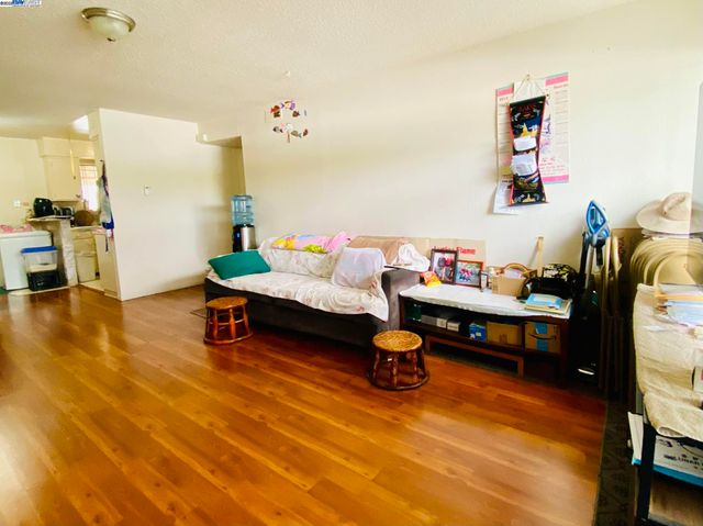 a bedroom with a bed and a table in it