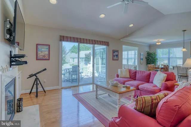 a view of a chair and table in the deck
