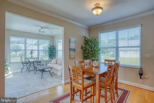 a bathroom with a toilet sink shower and mirror