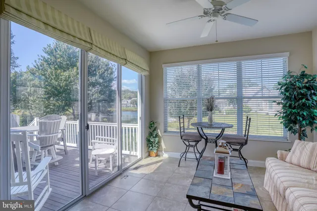 an aerial view of a house with a garden and swimming pool