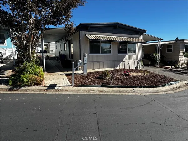 a front view of a house with garage