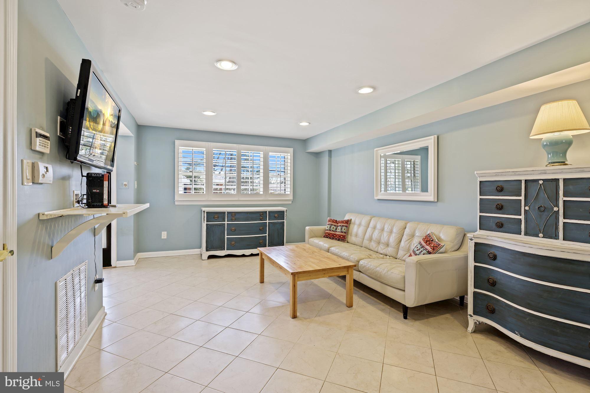 1118 Cresthaven Drive Silver Spring, MD 20903 - Photo 6 of 46 Main-level living room/den