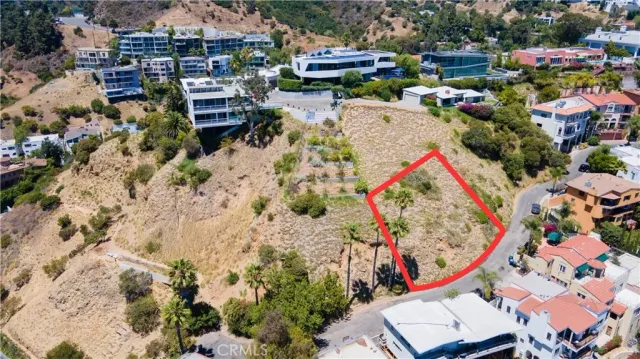 an aerial view of a houses with outdoor space