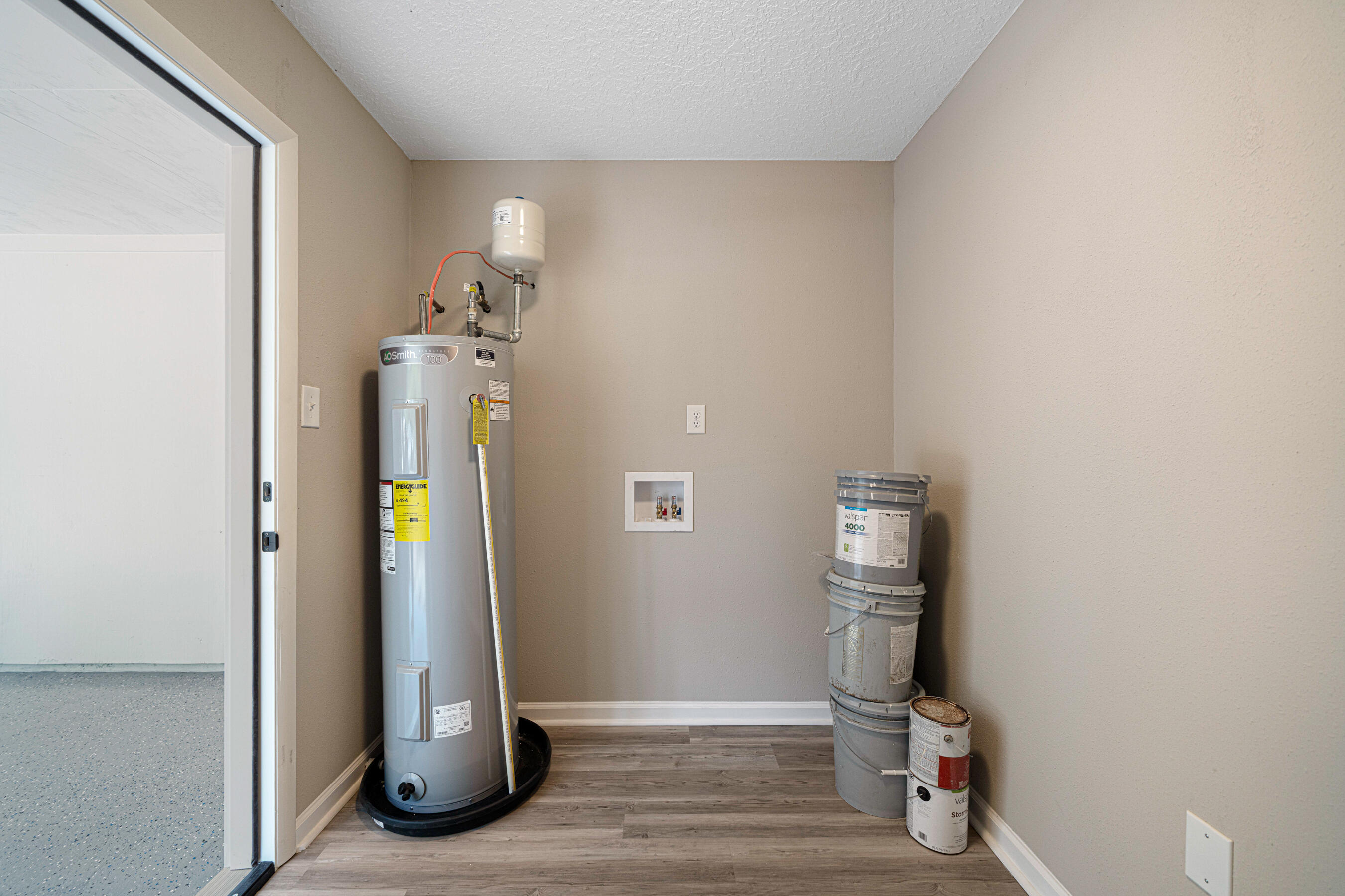 207 Oglesby Avenue Crestview, FL 32536 - Photo 17 of 30 a view of a livingroom with wooden floor