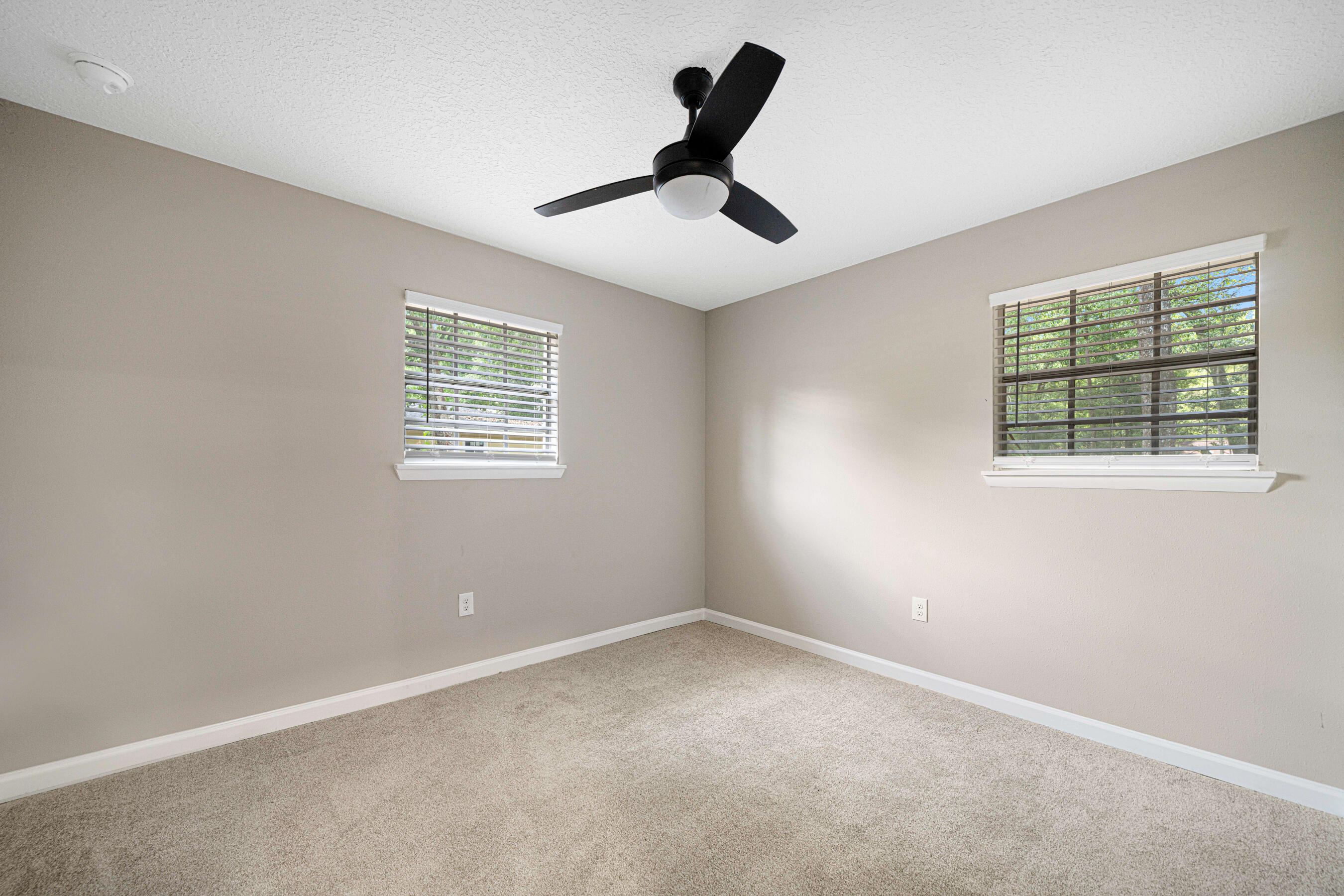 207 Oglesby Avenue Crestview, FL 32536 - Photo 21 of 30 an empty room with a window