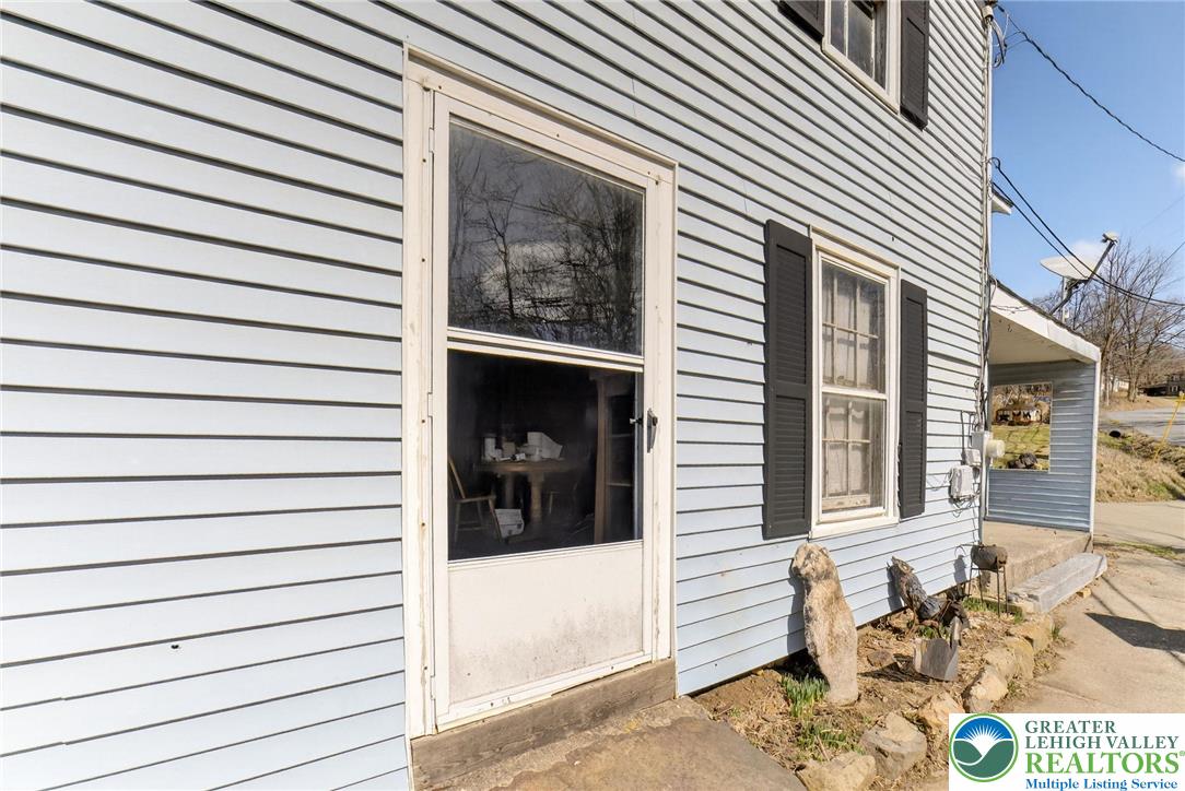 455 Morvale Road Easton, PA 18042 - Photo 34 of 47 a view of a porch with a bench