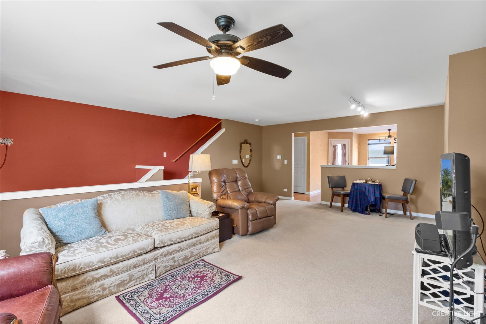 1005 Crane Point Elgin, IL 60124 - Photo 2 of 18 a living room with furniture and a flat screen tv