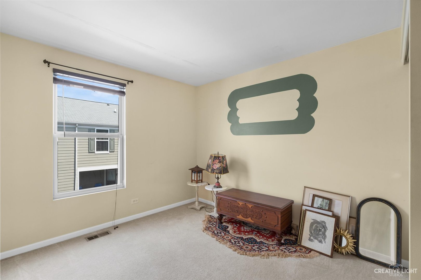 1005 Crane Point Elgin, IL 60124 - Photo 12 of 18 a room with furniture and window