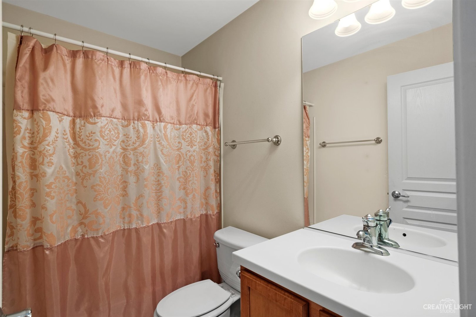 1005 Crane Point Elgin, IL 60124 - Photo 6 of 18 a bathroom with a sink and a mirror