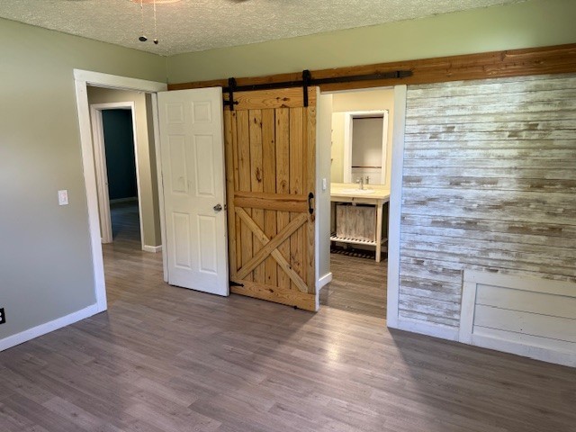 2000 Fairview Boulevard Fairview, TN 37062 - Photo 17 of 35 a view of an empty room with wooden floor and a window