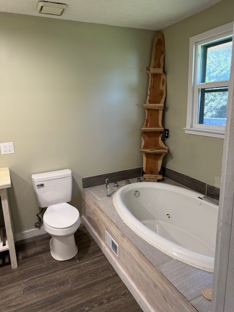 2000 Fairview Boulevard Fairview, TN 37062 - Photo 19 of 35 a bathroom with a toilet and a bathtub