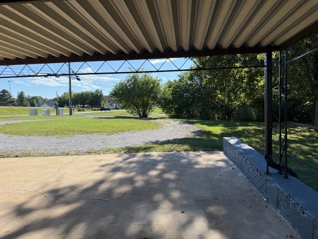 2000 Fairview Boulevard Fairview, TN 37062 - Photo 32 of 35 a view of a backyard with table and chairs under an umbrella