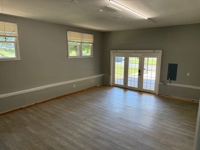 2000 Fairview Boulevard Fairview, TN 37062 - Photo 8 of 35 an empty room with wooden floor and windows
