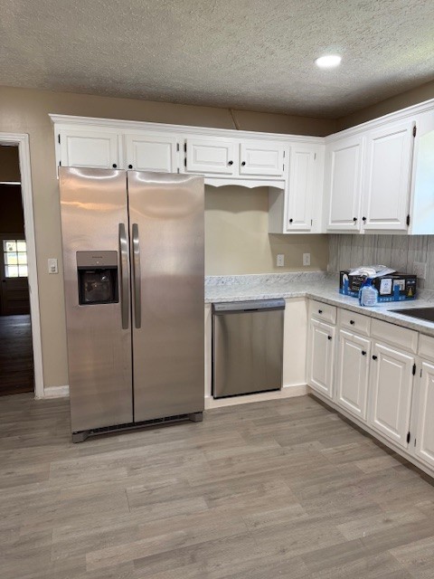 2000 Fairview Boulevard Fairview, TN 37062 - Photo 10 of 35 a kitchen with a refrigerator sink and cabinets