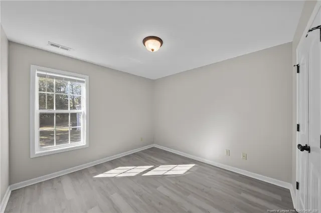 an empty room with a window