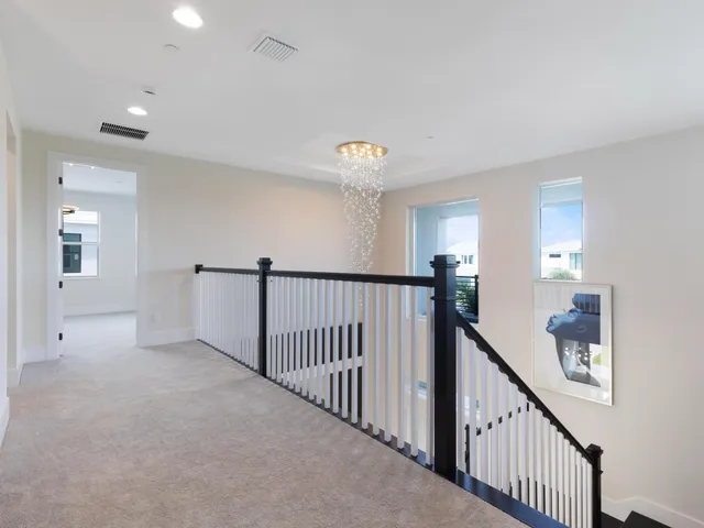 a bathroom with a sink vanity tub and toilet