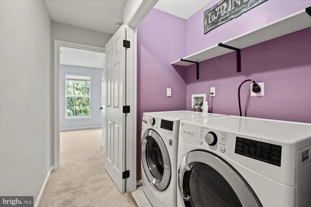 a bathroom with a granite countertop sink toilet and a mirror