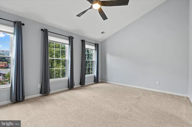 a view of backyard with tub and deck