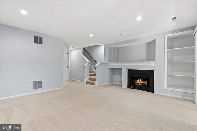 a bathroom with a sink a mirror and vanity