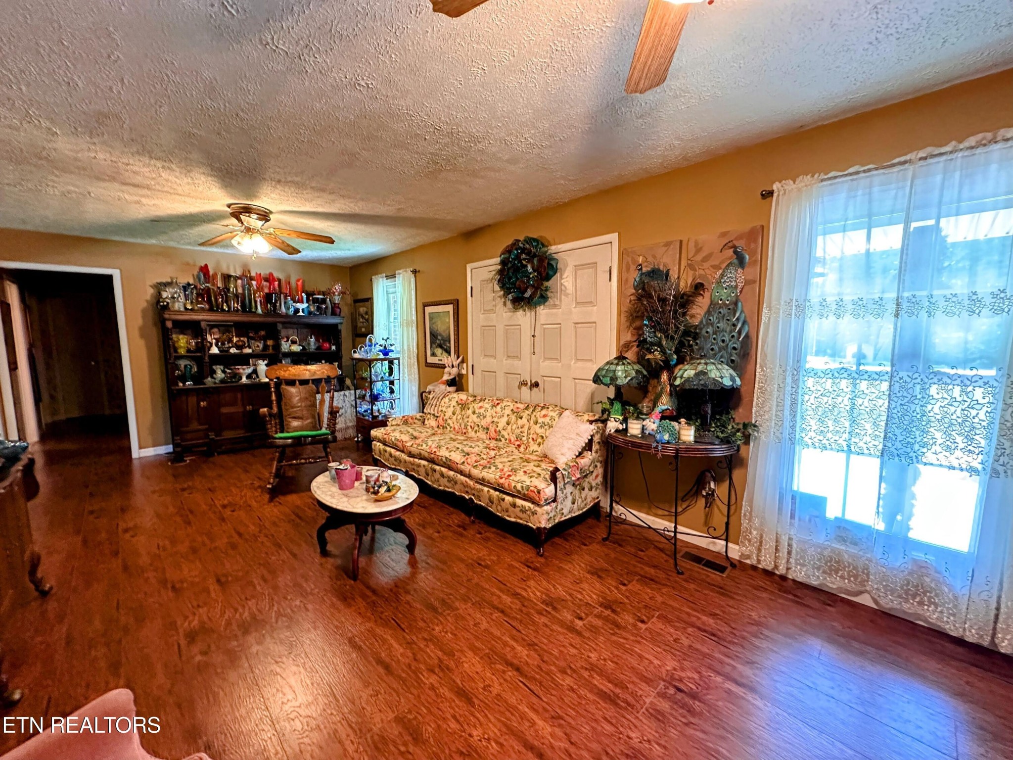1065 Star Point Road Jamestown, TN 38556 - Photo 19 of 40 a living room with furniture and wooden floor