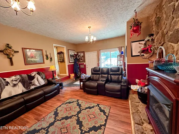 a living room with furniture and a couch