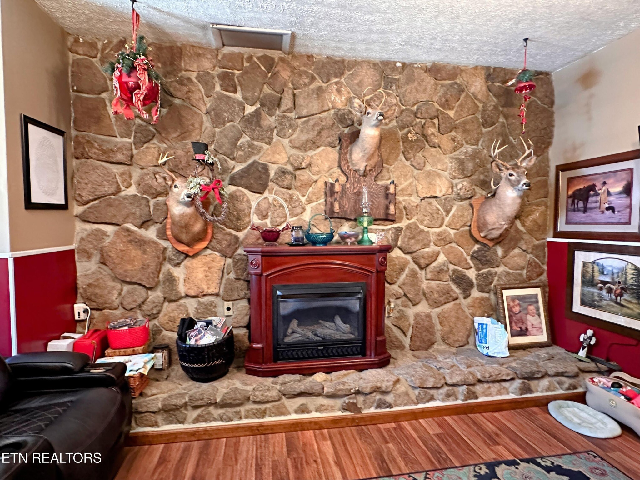 1065 Star Point Road Jamestown, TN 38556 - Photo 23 of 40 a living room with a fireplace and a fireplace