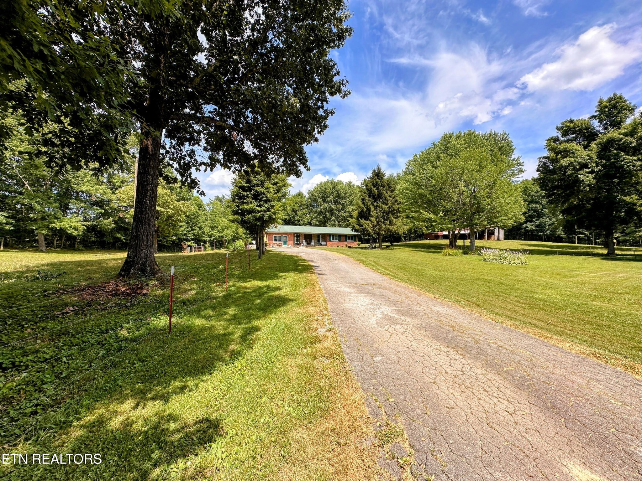 1065 Star Point Road Jamestown, TN 38556 - Photo 25 of 40 a view of a swimming pool with a yard