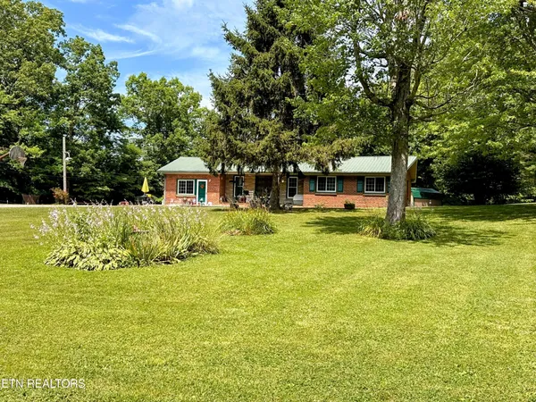 a view of a house with a big yard