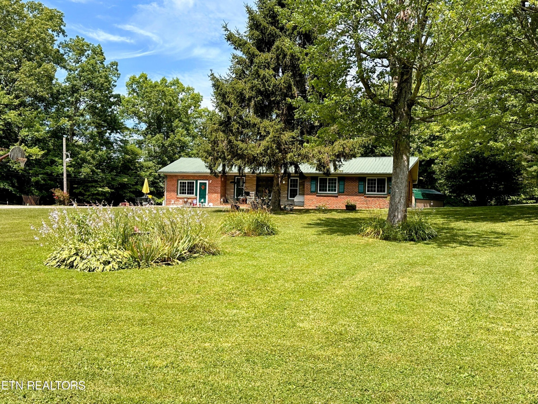 1065 Star Point Road Jamestown, TN 38556 - Photo 29 of 40 a view of a house with a big yard