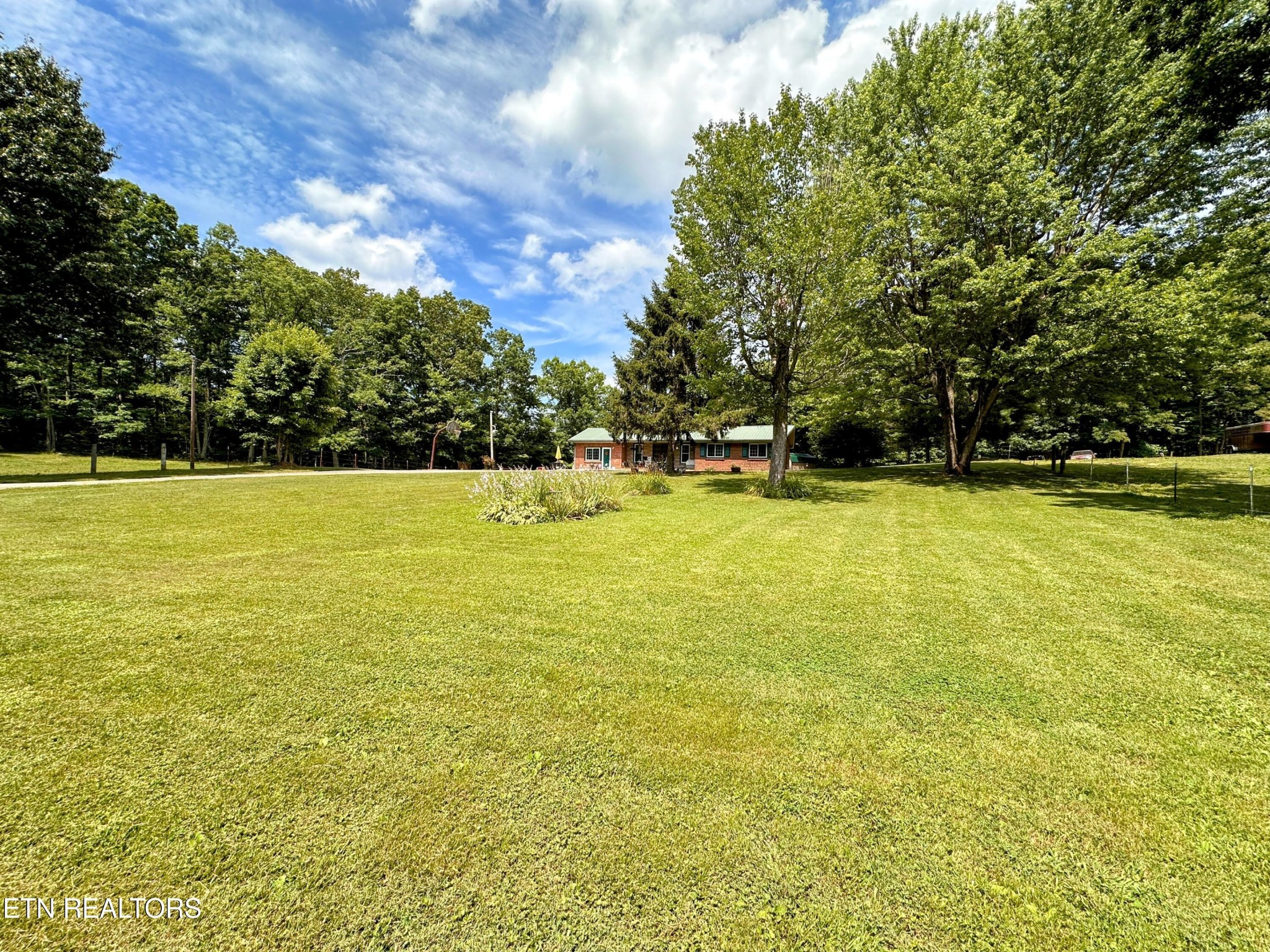 1065 Star Point Road Jamestown, TN 38556 - Photo 30 of 40 a view of a swimming pool and an outdoor space