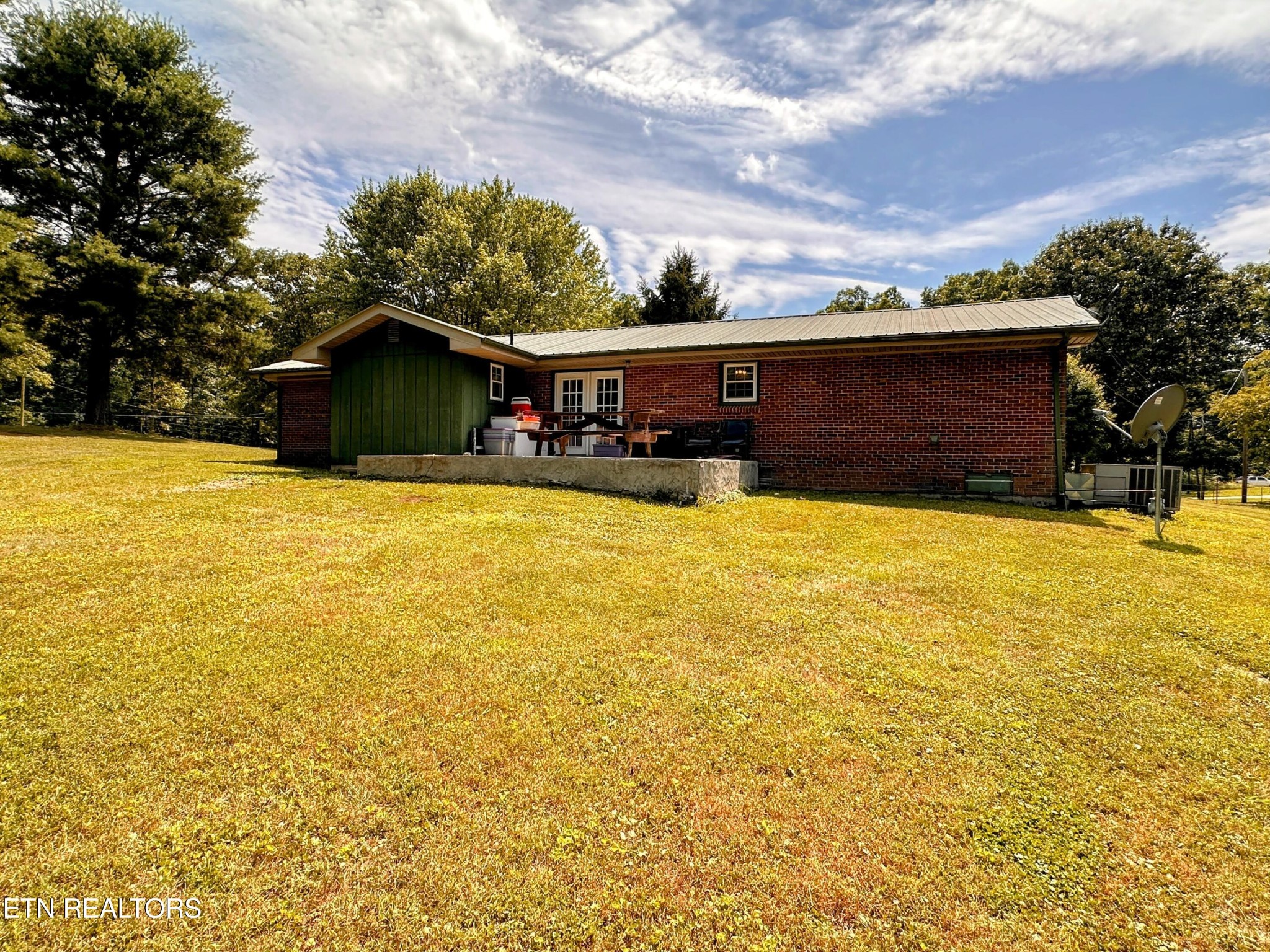 1065 Star Point Road Jamestown, TN 38556 - Photo 40 of 40 a view of a swimming pool with an outdoor seating