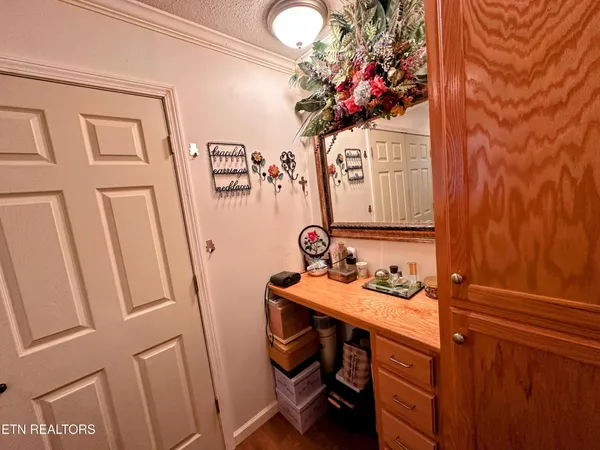 a bathroom with a sink vanity and a mirror