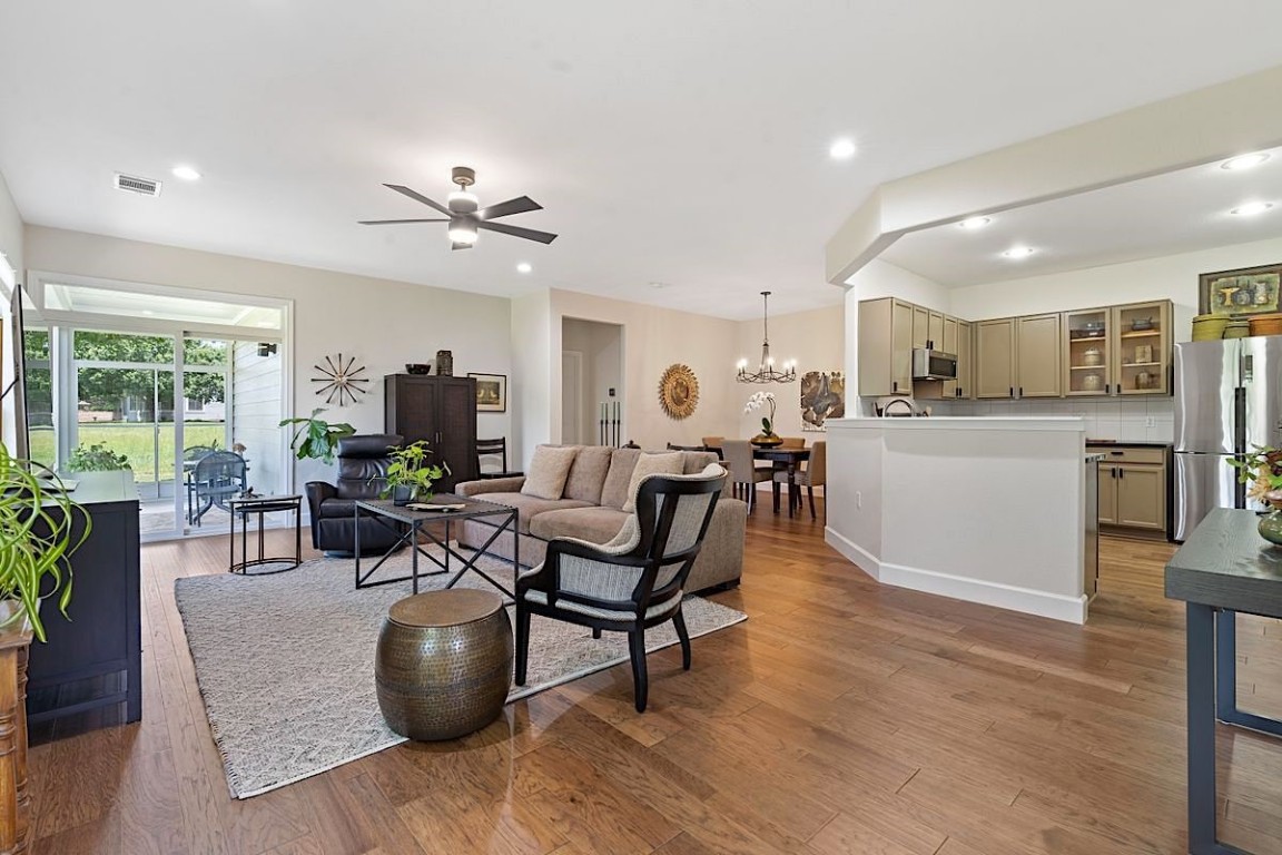 257 Bonham Loop Georgetown, TX 78633 - Photo 1 of 1 a living room with furniture and kitchen view