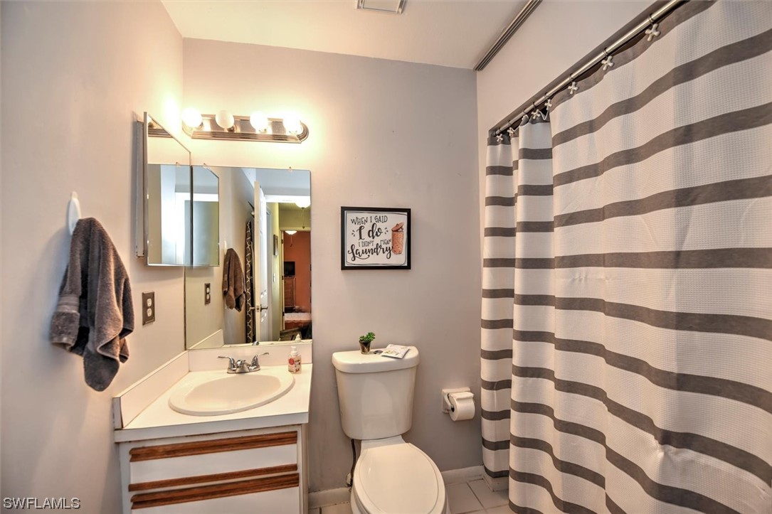 13260 Broadhurst Loop Fort Myers, FL 33919 - Photo 22 of 25 a bathroom with a sink toilet and shower