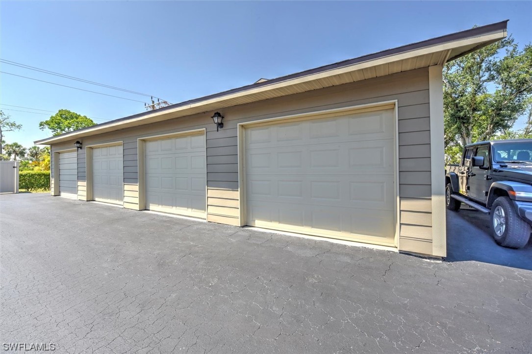 13260 Broadhurst Loop Fort Myers, FL 33919 - Photo 24 of 25 a view of a house with a garage
