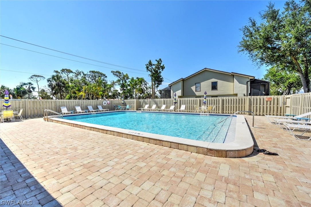 13260 Broadhurst Loop Fort Myers, FL 33919 - Photo 25 of 25 a view of backyard with a garden and entertaining space
