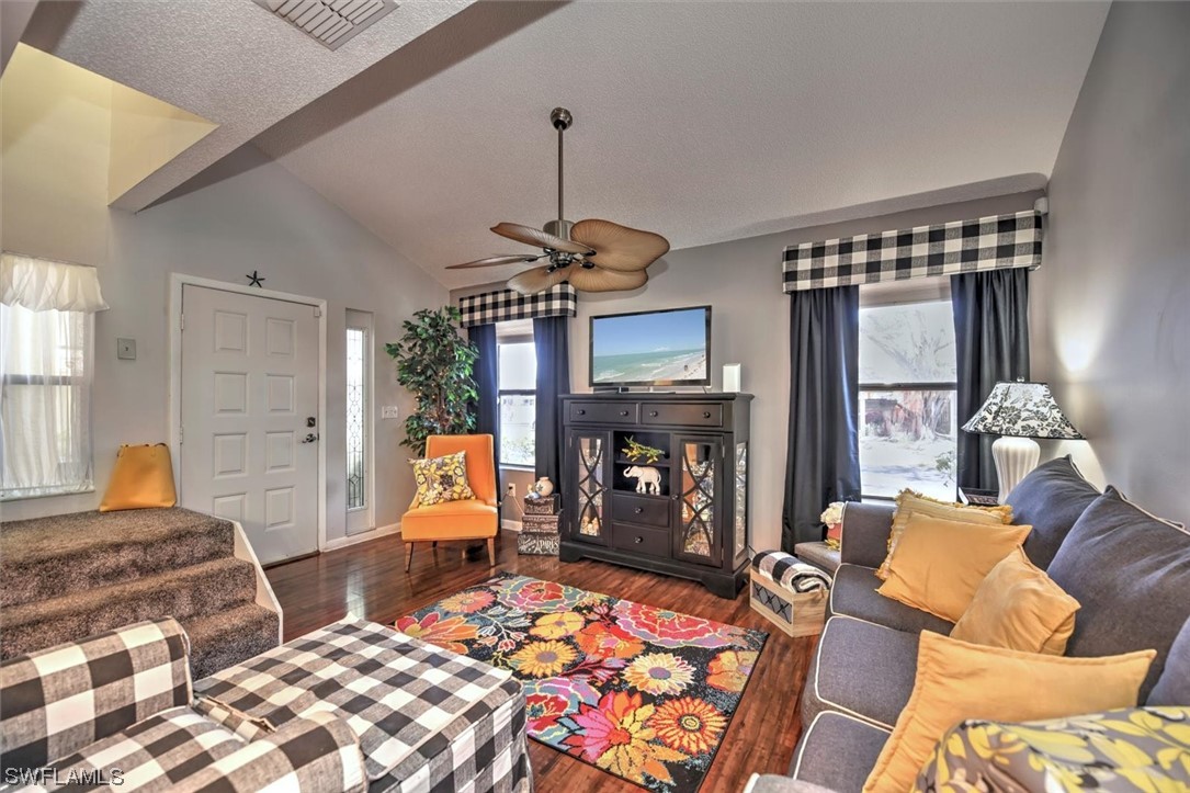 13260 Broadhurst Loop Fort Myers, FL 33919 - Photo 8 of 25 a bedroom with a bed and wooden floor