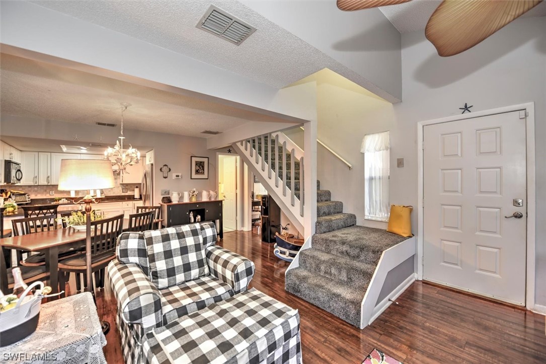 13260 Broadhurst Loop Fort Myers, FL 33919 - Photo 9 of 25 a living room with furniture and wooden floor